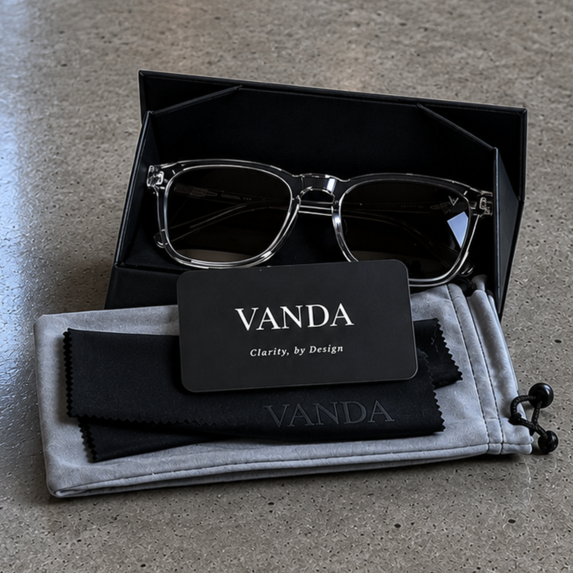 VANDA eyewear signature packaging with foldable case, suede pouch and microfibre cleaning cloth